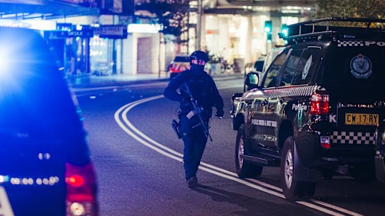 Bondi Junction Westfield and streets surrounding were in lockdown and closed as police and ambulance respond to multiple stabbing and shooting casualties. As night draws in the police investigation continues, Saturday 13th of April 2024. Photo: Dion Georgopoulos / The Sydney Morning Herald