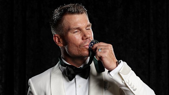 Sealed with a kiss: David Warner with his Allan Border Medal.