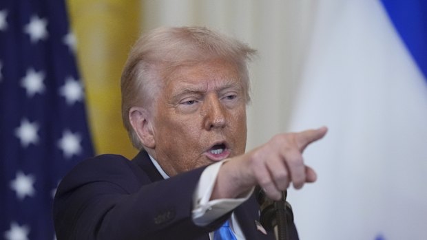 United States President Donald Trump takes questions during a press conference with Israel Prime Minister Benjamin Netanyahu.