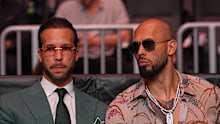 Andrew Tate, right, and his brother Tristian Tate at an Ultimate Fighting Championship match in Miami in April.