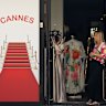 A shop worker stands at the door during the outage.