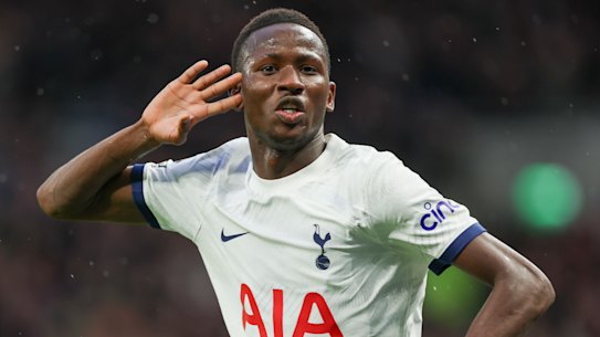Tottenham’s Pape Matar Sarr celebrates scoring his side’s first goal during the English Premier League soccer match between Tottenham Hotspur and Brighton & Hove Albion at the Tottenham Hotspur Stadium in London, Saturday, Feb. 10, 2024. (AP Photo/Ian Walton)