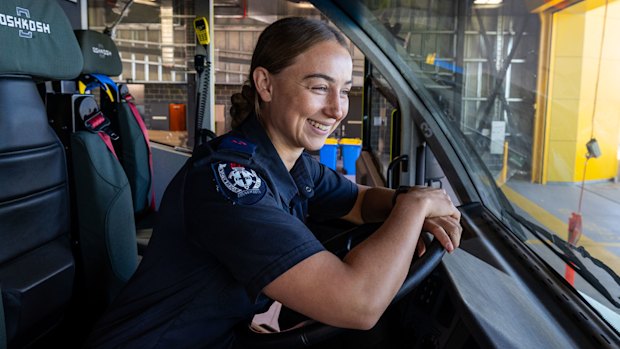 Firefighter Amber Murphy behind the wheel of one of the new state-of-the-art trucks at Western Sydney Airport.
