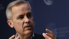 Mark Carney has tried to reassure investors amid concerns that they faced growing legal risks for appearing to avoid carbon-intensive sectors.