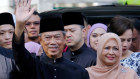 Muhyiddin Yassin, Malaysia's new prime minister waves to members of the media ahead of the swearing in ceremony on Sunday.