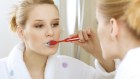 Dentists say skipping the rinse after brushing allows fluoride to stay on the teeth.