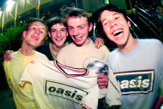 Oasis fans and their merch T-shirts in 1996, when band tees were everywhere.