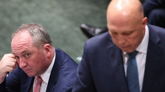 The Leader of the House, Peter Dutton (right), sought to toss Barnaby Joyce a lifebuoy by demanding the Nationals’ motion be ruled out of order.