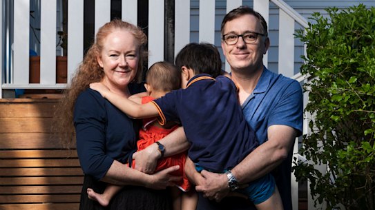 Sydney parents Fiona and Charles with their two adoptive children who have just come out of coronavirus quarantine. 