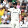 Beau Webster of Australia celebrates reaching his half century. 
