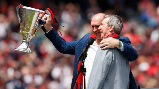 David Neitz and Neale Daniher with the cup at the MCG.