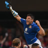 CARDIFF, WALES - MARCH 19: Italy centre Juan Ignacio Brex is lifted high by Toa Halafihi during the celebrations after the Six Nations Rugby match between Wales and Italy at Principality Stadium on March 19, 2022 in Cardiff, Wales. (Photo by Stu Forster/Getty Images)