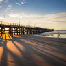 Mystery clues discovered near human remains on NSW beach