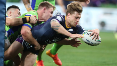 Line honours: Cameron Munster scores for Storm during their round 20 win over 