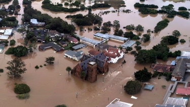 An aerial view of the devastation around St Carthage’s Cathedral and Trinity Catholic College Lismore.