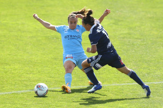 Tyla-Jay Vlajnic and Lisa De Vanna face off in the W-League earlier this year.