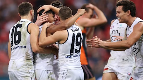 SYDNEY, AUSTRALIA - MAY 15: Jesse Motlop of the Blues celebrates kicking a goal during the round nine AFL match between the Greater Western Sydney Giants and the Carlton Blues at GIANTS Stadium on May 15, 2022 in Sydney, Australia. (Photo by Cameron Spencer/AFL Photos/via Getty Images )