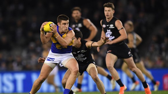 Dynamic: West Coast midfielder Elliot Yeo stays a step ahead of the Blues.