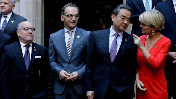 From right, Julie Bishop talks to Chin's Wang in, as Germany's Heiko Maas, and Argentina's Jorge Faurie, look on during the G20 foreign ministers meeting in Buenos Aires on Monday.