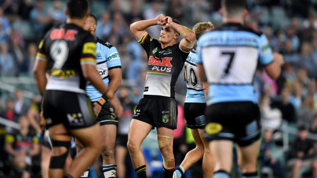 Cruel miss: Nathan Cleary reacts after missing a field goal that would have levelled scores against the Sharks.