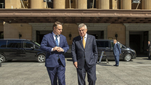 IOC president Thomas Bach (right) and Brisbane Lord Mayor Adrian Schrinner are seen taking a quick tour outside the Brisbane City Hall.