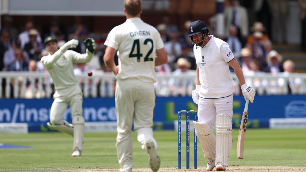Alex Carey throws down the stumps of an unsuspecting Jonny Bairstow on day five.