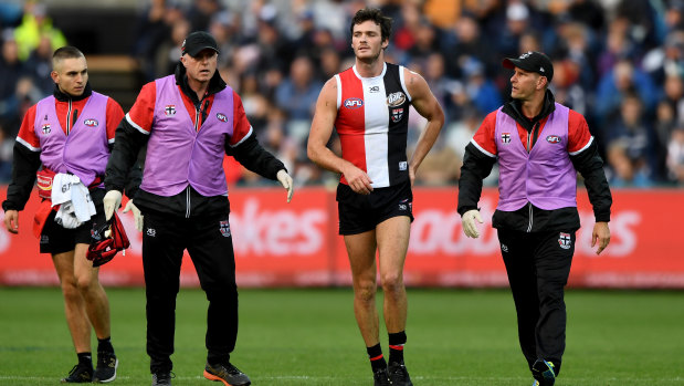 Dylan Roberton leaving the ground after his collapse in round four.