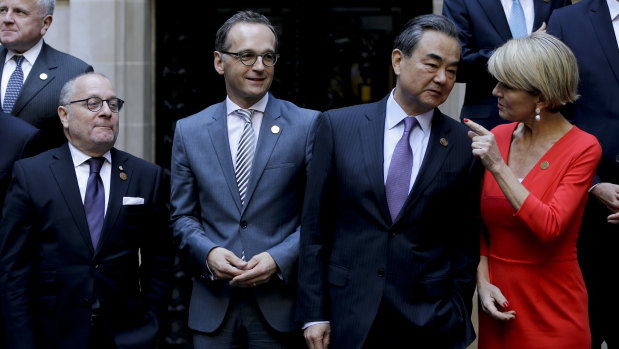 From right, Julie Bishop talks to Chin's Wang in, as Germany's Heiko Maas, and Argentina's Jorge Faurie, look on during the G20 foreign ministers meeting in Buenos Aires on Monday.