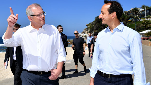 Prime Minister Scott Morrison and Liberal candidate for Wentworth Dave Sharma at Bronte beach on Friday. 
