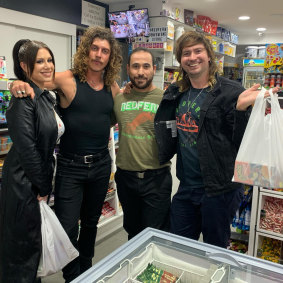 Redfern Convenience Store owner Hazem Sedda with members of the band Peking Duk .