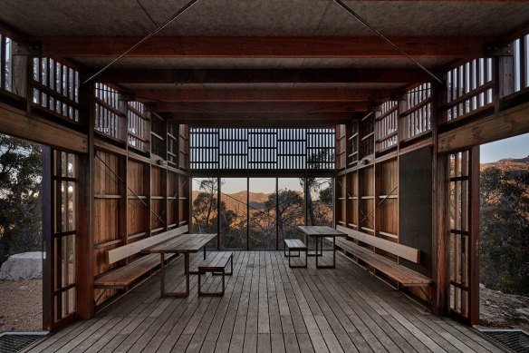 The huts are evocative of a Japanese teahouse, with sliding doors and translucent polycarbonate walls.