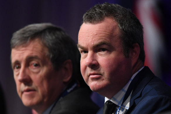 Outgoing Victorian Liberal director Simon Frost sits with state president Robert Clark at the party's state conference in June