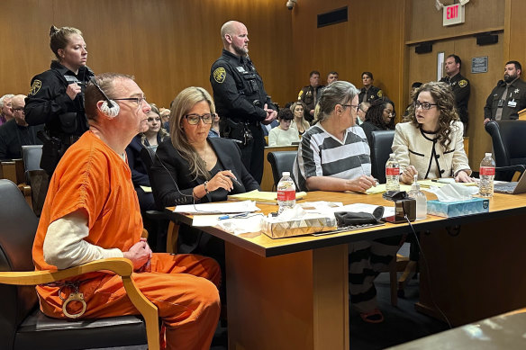 From left,  James Crumbley, defence lawyer Mariell Lehman, Jennifer Crumbley, and defence lawyer Shannon Smith await sentencing in Oakland County. 