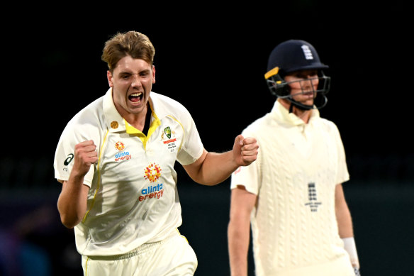 Cameron Green celebrates after bowling Dawid Malan on day three on Sunday.