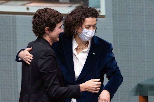 Member for Curtin, Kate Chaney, is congratulated by Dr Monique Ryan after delivering her first speech in the House of Representatives. 