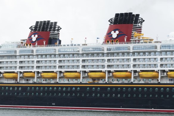 The twin funnels of Disney Wonder with the iconic Mickey Mouse logo.