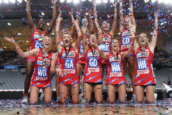 The Swifts celebrate their grand final victory over the Giants.