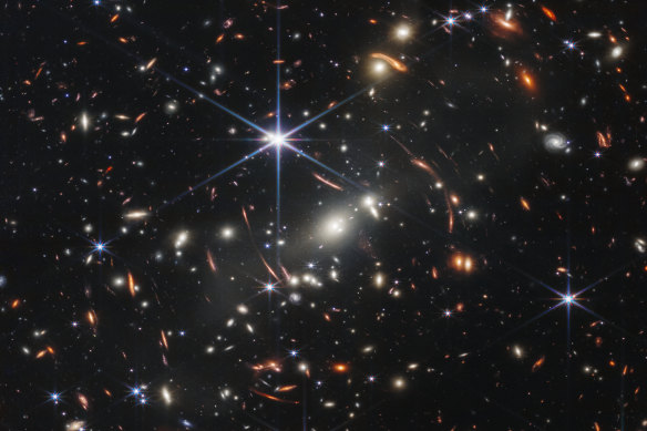 An image captured by the James Webb Space Telescope shows galaxy cluster SMACS 0723.