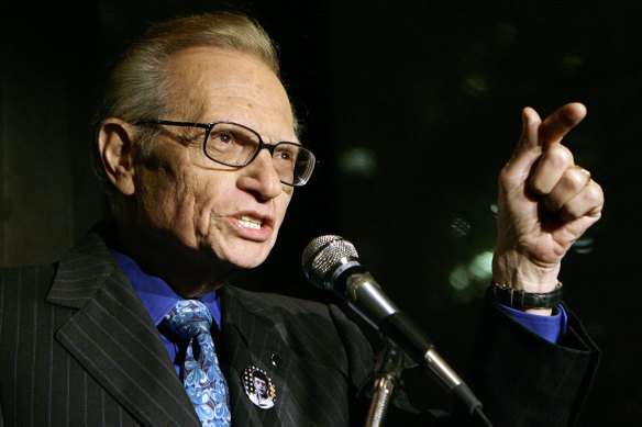 Larry King speaks to guests at a 2007 CNN party celebrating his 50 years of broadcasting. 