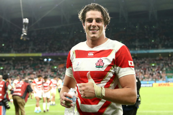 Stoked: Australian-born player James Moore celebrates Japan's 19-12 victory over Ireland at the Rugby World Cup. 