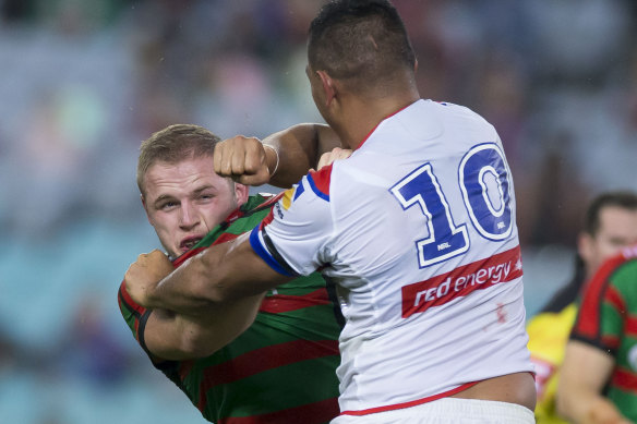 Two to tango: Daniel Saifiti goes at it with South Sydney's Tom Burgess in round 13. Both players were sin-binned. 