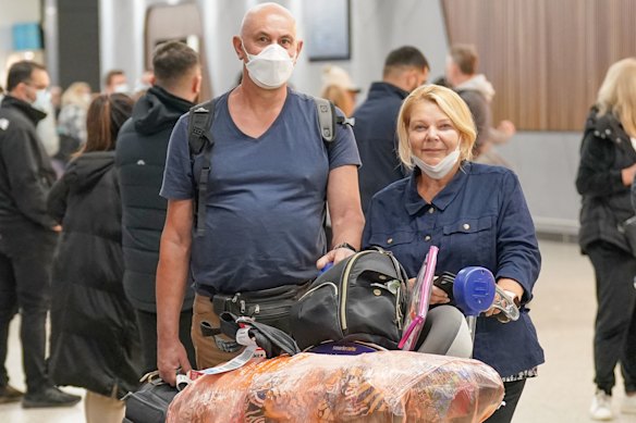 Julie and Tony Comopoulos at Melbourne Airport after arriving back from Bali on Saturday morning.