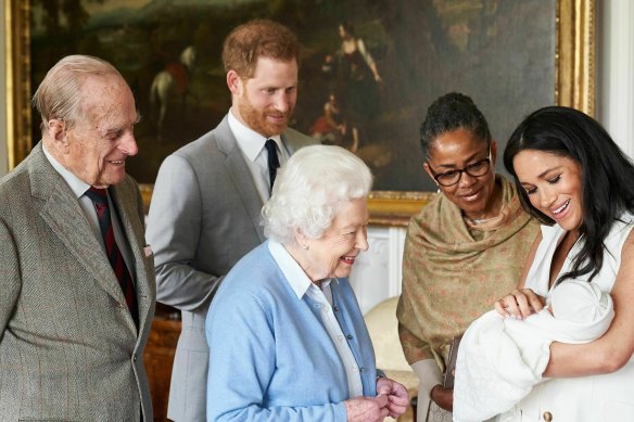 Prince Harry and Meghan, joined by her mother Doria Ragland, introduce Archie to the Queen and Prince Philip in 2019.