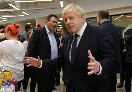 British Prime Minister Boris Johnson speaks to staff and students at Bolton University in England on Saturday.