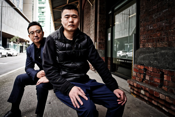Lawyer and advocate Sean Dong (left) with Qi in Melbourne. 
