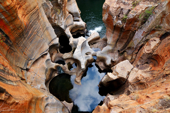 The Potholes sculpted by constant movement where the rivers meet.