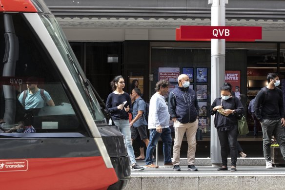 People make the most of free public transport in central Sydney on Thursday.