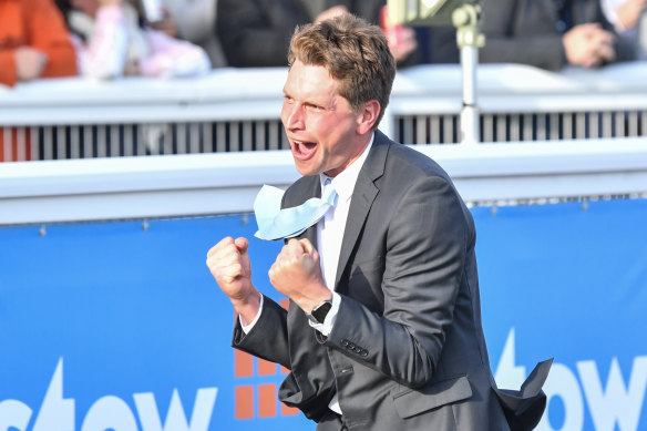 Mitchell Freedman celebrates Attrition’s win in the group 1 Toorak Handicap.