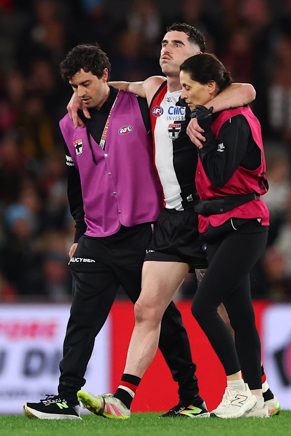 Sam Flanders was helped from the Marvel Stadium surface by the Saints trainers.