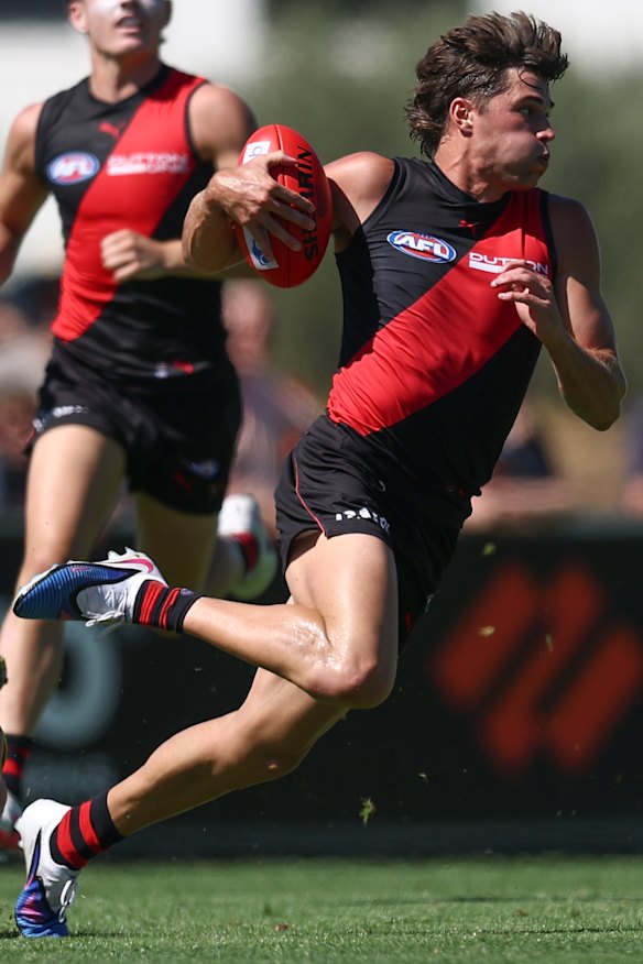 Sam Durham breaks clear for the Bombers.